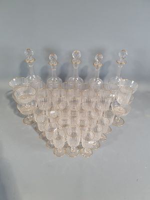 a lot of empty wine glasses sitting on a table