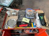 a table with a lot of assorted items on top of it