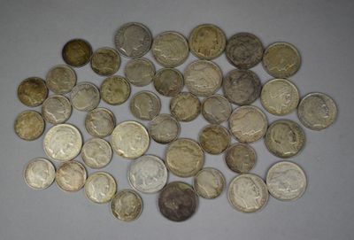 a lot of coins that are on the table