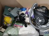 a box full of assorted items including a vacuum