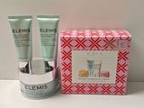 the contents of the elemis skin care set are displayed on a table
