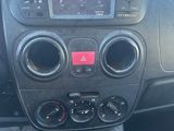 the interior of a car with a dashboard and various gauges and controls