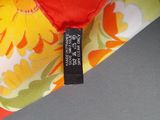 a close up of a pillow with a label on it