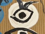 a painting of an eye and a bird on a cardboard box