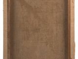 an old photo of a picture frame with a brown paper backing