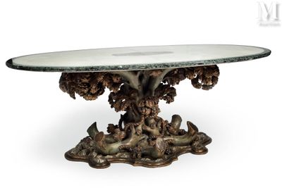 an image of a table with a glass top and a tree on it