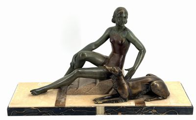 statue of a woman and a dog sitting on a wooden platform