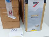 two boxes that are sitting on a white table