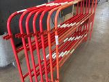 a lot of red pipes that are on the floor