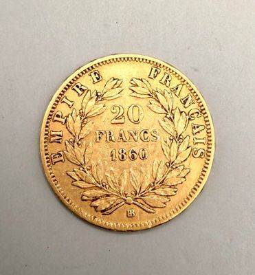 une image représentant une pièce d'or ornée d'une couronne de feuilles