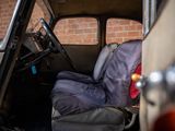 a seat in the back of a car with a bag on it