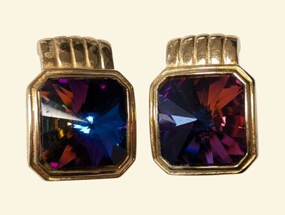 pair of purple and blue crystal earrings on a white background
