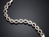 a diamond and sapphire bracelet, by person