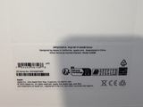 the back of a white box with a picture of a person holding a cell phone