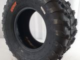 a close up of a tire on a white surface with a white background