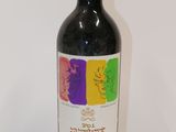 a bottle of wine that is sitting on a table