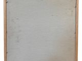 an old picture of a picture frame with a small hole in it