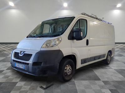 a white van that is parked in a room