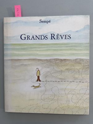 a book with a picture of a man walking a dog on the beach