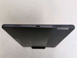 a close up of the back of a laptop computer with its lid open
