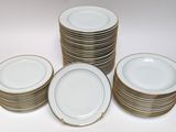 a lot of plates that are stacked on top of each other
