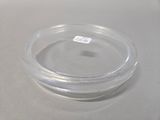 a clear plastic container with a lid on a table