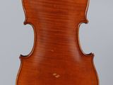 an old violin with a wooden back and a long neck