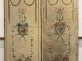pair of antique embroidered panels with flowers and birds on them