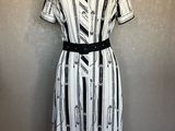 a black and white striped dress on a mannequin mannequin mannequin mannequin mannequin mannequin mannequin mannequin