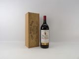 une image d'une bouteille de vin à côté d'une caisse en bois