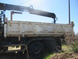 a truck with a crane on the back of it