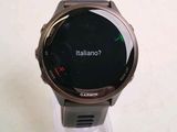 a smart watch that is sitting on top of a stand