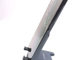 a cell phone that is sitting on a stand
