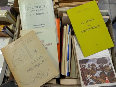 a pile of books sitting on top of a table