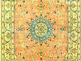 an orange and blue rug with a medallion design on it