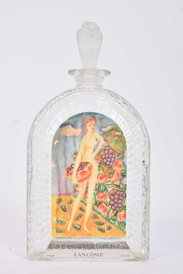 a glass bottle with a picture of a woman on it