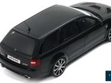 the toy car is black and has a white stripe on the roof