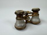 a pair of binoculars that are sitting on a table