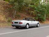 a car that is driving down the road in the daytime