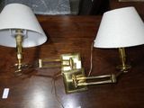 two lamps that are on a table next to each other