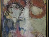 a painting of a woman with a hat on a easel