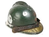 a green helmet with a skull and crossbones on it