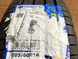 a close up of a tire on a box with a sticker on it