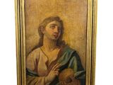 une peinture ancienne représentant une femme tenant un bébé dans ses bras