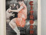 an open book with a drawing of a woman sitting on a couch with a dog