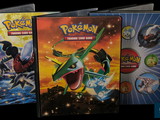 three dvd covers of pokemon movies on a black background