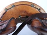 a close up of a pair of shoes and a bag