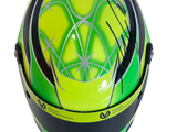 the helmet of a person wearing a green and black helmet