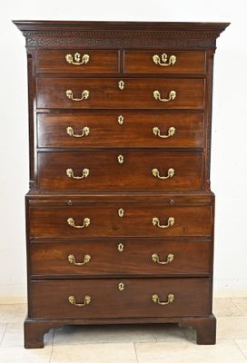 an image of a tall chest of drawers in a room