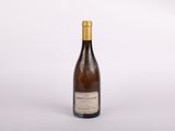 a bottle of wine that is sitting on a table